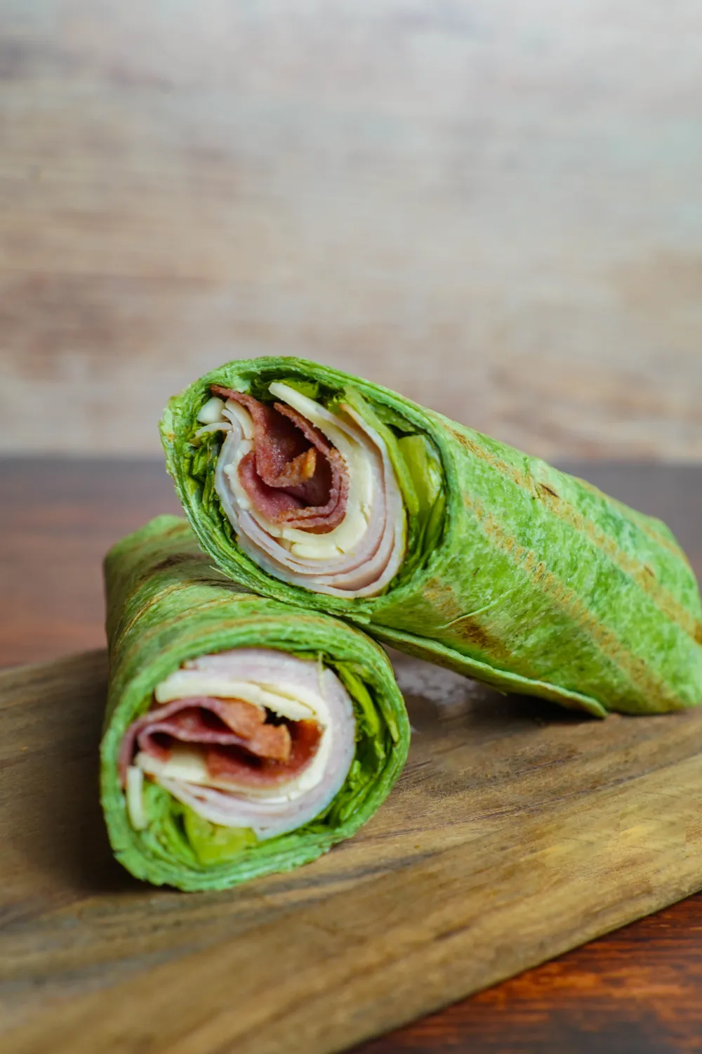 Green wrap with sandwich meat and lettuce